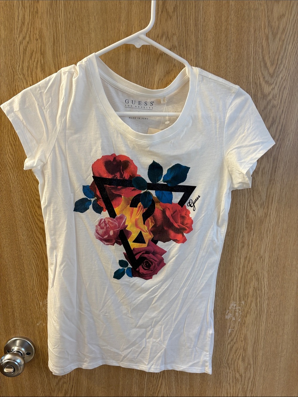 GUESS White Floral Triangle Logo Tee with Red and Pink Roses